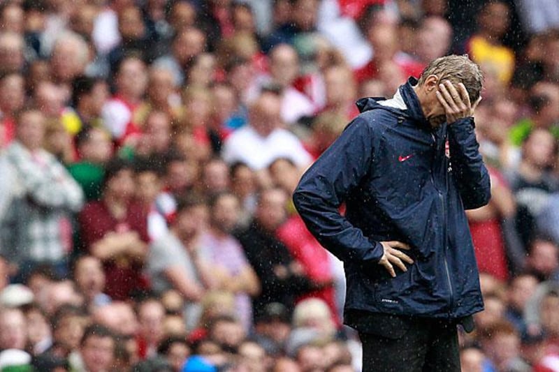 Arsene Wenger, the Arsenal manager, produces his first "facepalm" of the season, though he said after his sides' 2-0 defeat that it is not all "gloom".

Stefan Wermuth / Reuters