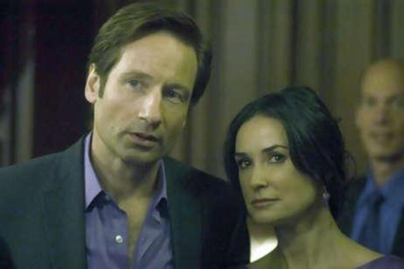 Demi Moore as Kate and David Duchovny in The Joneses.