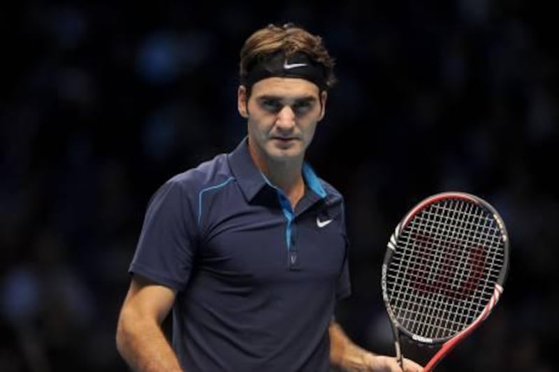 Switzerland's Roger Federer competes against Spain's David Ferrer during the Barclays ATP World Tour Finals at the O2 Arena, London.
