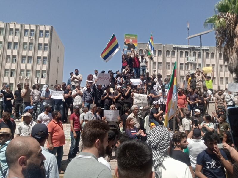 A demonstration on Wednesday against President Assad in the mostly Druze city of Suweida in south-west Syria. Suwayda24.