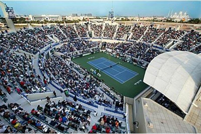 Thousands of tennis fans surround the court at the Zayed Sports City Stadium in Abu Dhabi for the Capitala tournament in January.