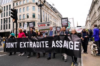 A pro-Julian Assange protest with his partner Stella Morris (4th L) and Wikileaks editor-in-chief Kristin Hrafnsson (5th L). AP