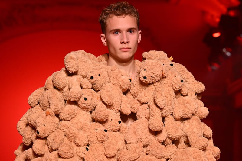 A model presents a teddy-bear themed creation by Swiss fashion house Vetements at Paris Fashion Week. AFP