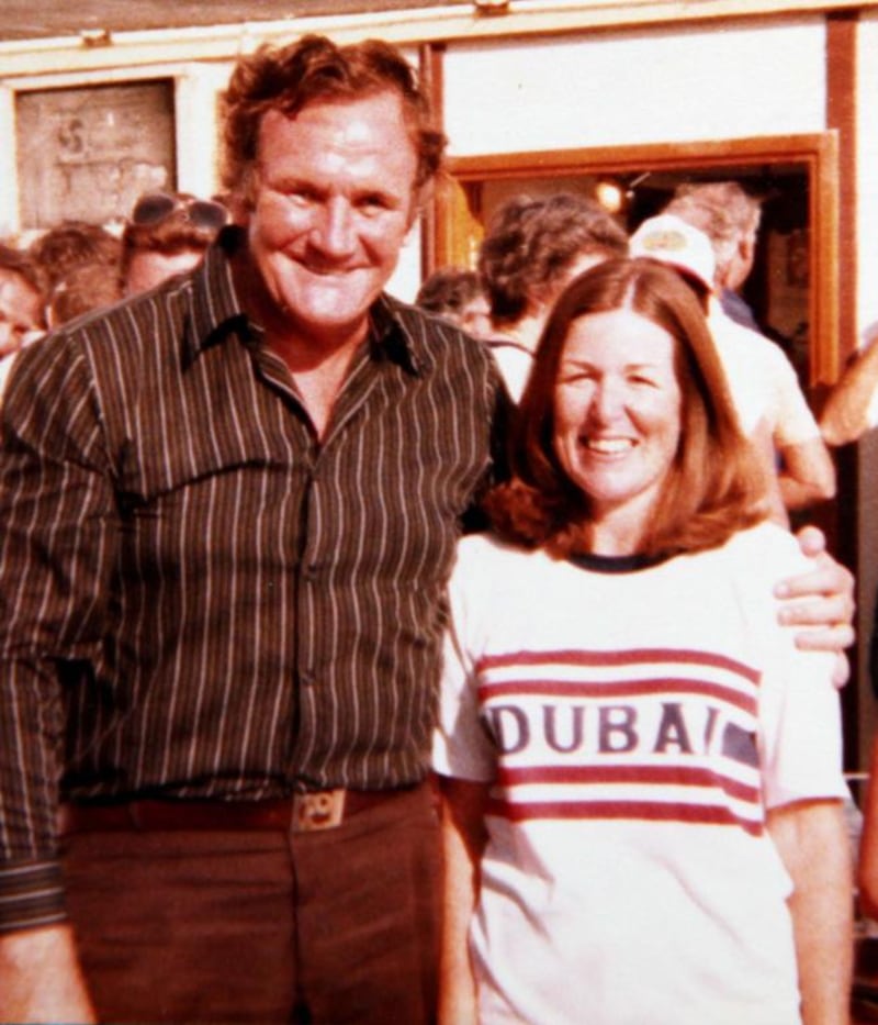 Don Revie in UAE with a young fan wearing a Dubai T shirt.