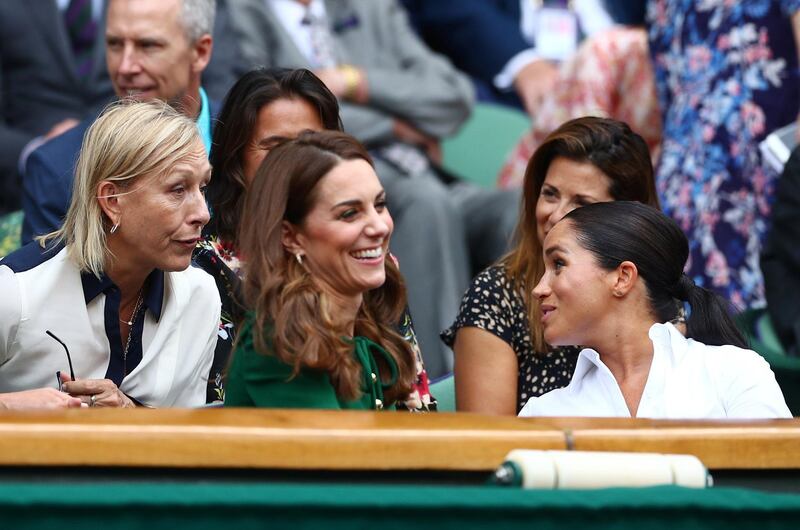 Former tennis player Martina Navratilova, Meghan, Duchess of Sussex, and Britain's Catherine, Duchess of Cambridge, in the Royal Box ahead of the final between Serena Williams of the U.S. and Romania's Simona Halep REUTERS/Hannah McKay