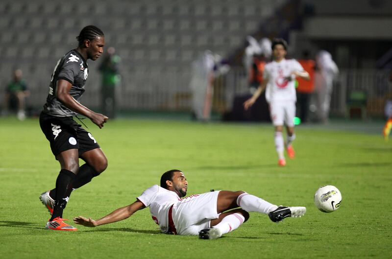 AL AIN , UNITED ARAB EMIRATES Ð Sep 4 :  Makhet ( no 99 in grey ) of Al Dhafra and Salmain ( no 26 in white ) of Sharjah in action during the Pro League round robin tournament football match between Sharjah vs Al Dhafra at Tahnoun Bin Mohammed Stadium in Al Ain. ( Pawan Singh / The National ) For Sports
