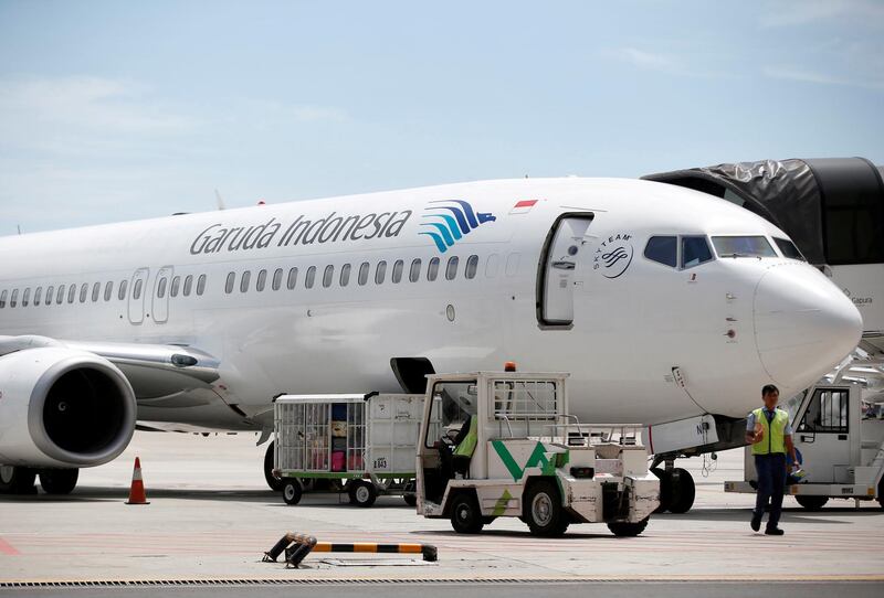 FILE PHOTO: A plane belonging to Garuda Indonesia is seen on the tarmac of Terminal 3, SoekarnoÐHatta International Airport near Jakarta, Indonesia April 28, 2017.   REUTERS/Darren Whiteside/File Photo