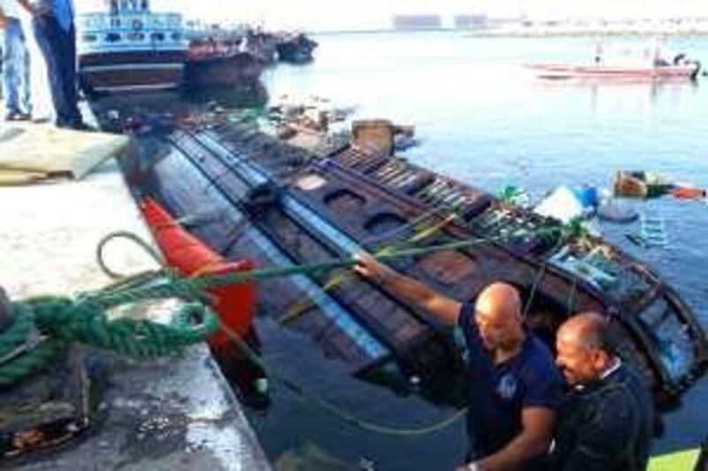 May 2, 2010-Dubai, UAE- sunken boat on dubai creek 
courtesy of Dubai Police.