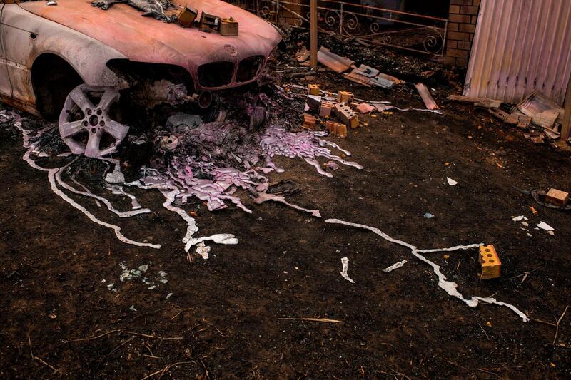 Environment group Greenpeace Australia-Pacific shows a destroyed car which melted when bushfires hit properties in the area of Conjola Park on the south coast of New South Wales on January 4. Haunting images of koalas with singed fur, possums with burnt paws or countless charred kangaroo carcasses have flashed around the world and have come to symbolise a nation and an environment buckling under the weight of a climate-fuelled crisis. AFP