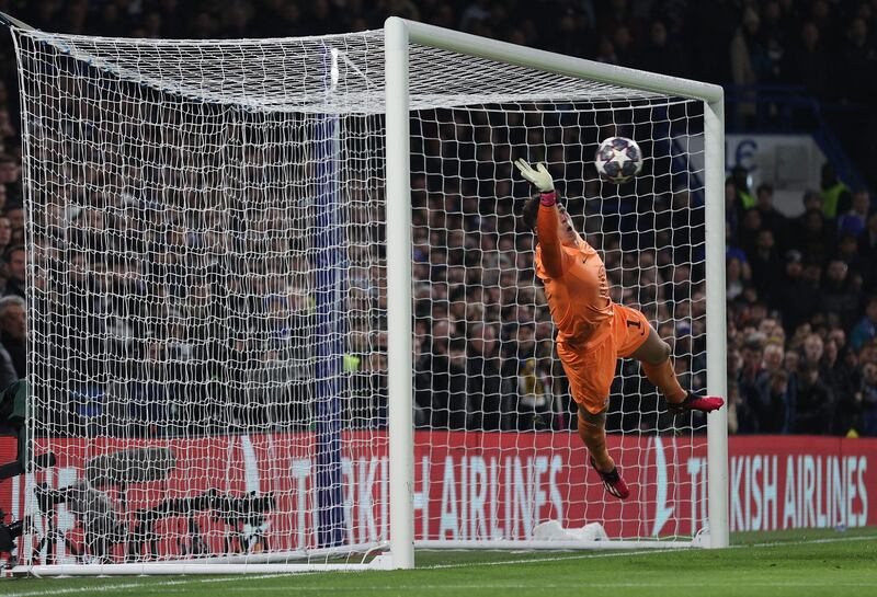 Chelsea goalkeeper Kepa Arrizabalaga makes a save from a Borussia Dortmund free-kick. AFP
