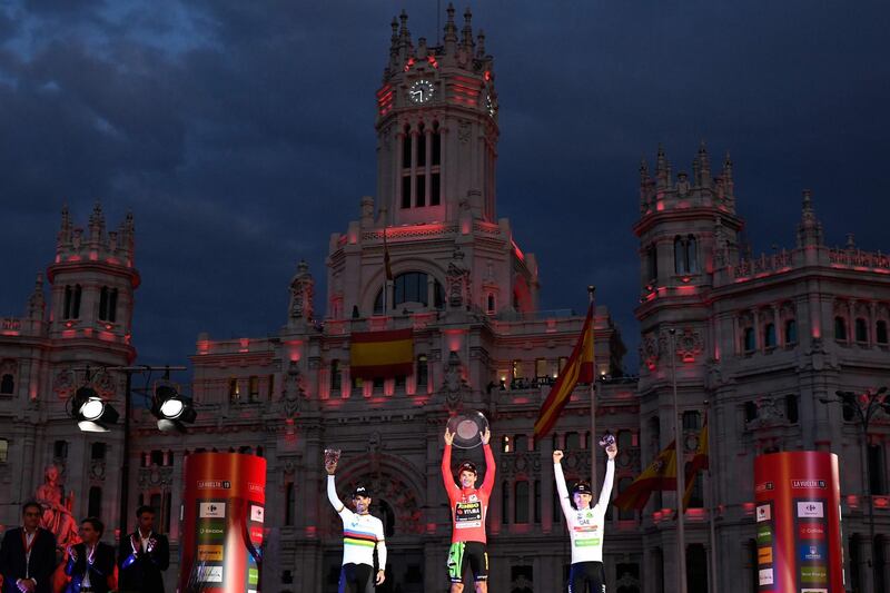All three celebrate under the night sky of Madrid.  AFP