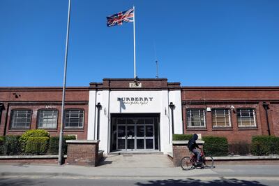 A cyclist passes the Burberry Group Plc factory in Castleford, U.K., on Tuesday, April 21, 2020. The U.K. ran the risks running out of protective equipment for its hospital staff as half the doctors working in high-risk areas reported supply shortages in an April survey by the British Medical Association. Photographer: Chris Ratcliffe/Bloomberg
