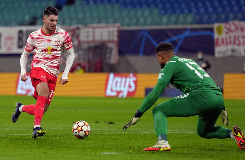 Leipzig's Dominik Szoboszlai scores his side's opening goal. AP