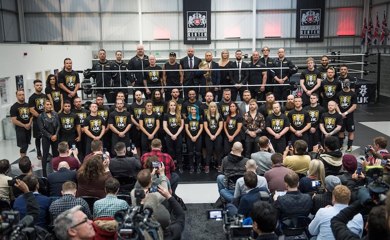The WWE superstars and staff at the UK Performance Centre in London at its launch in January. Image courtesy of WWE
