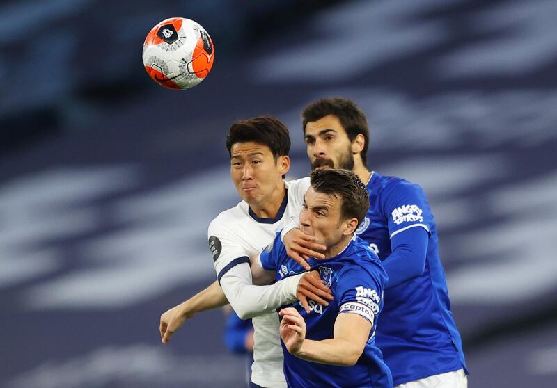 Tottenham Hotspur's Son Heung-min in action with Everton's Seamus Coleman and Andre Gomes. Reuters