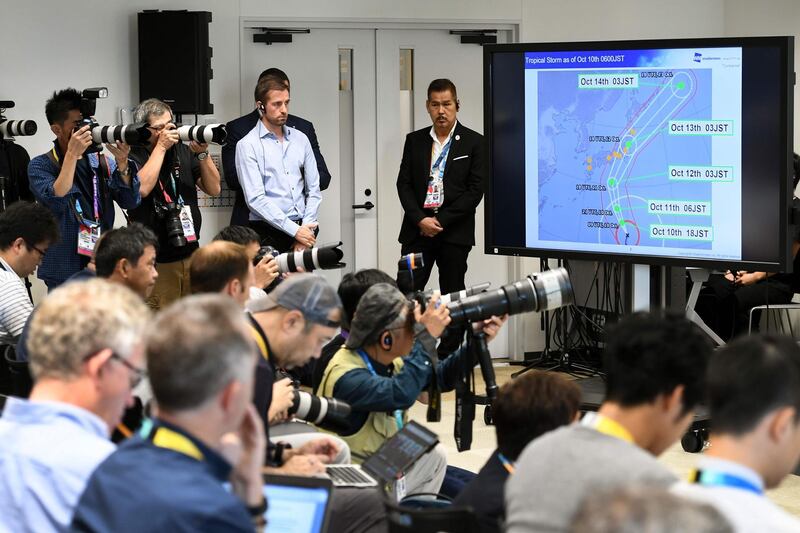 A screen displays the path of the approaching typhoon Hagibis, which will affect upcoming matches in the Japan 2019 Rugby World Cup. AFP