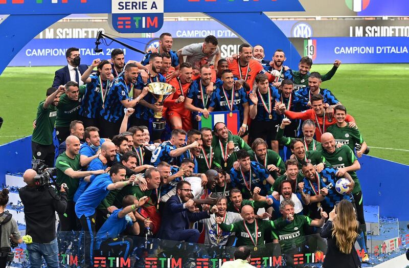 Inter Milan players celebrate winning the Serie A title. AFP