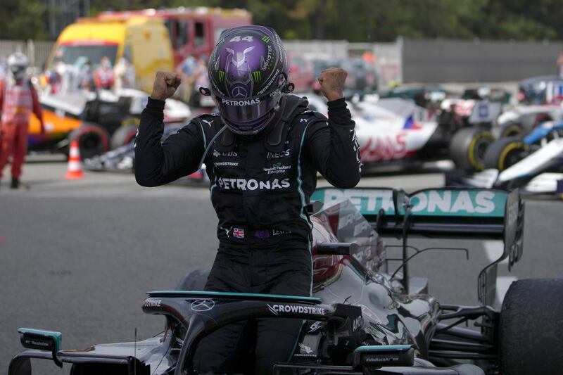 Mercedes driver Lewis Hamilton celebrates after winning the Spanish Grand Prix at the Catalunya racetrack in Montmelo. AP