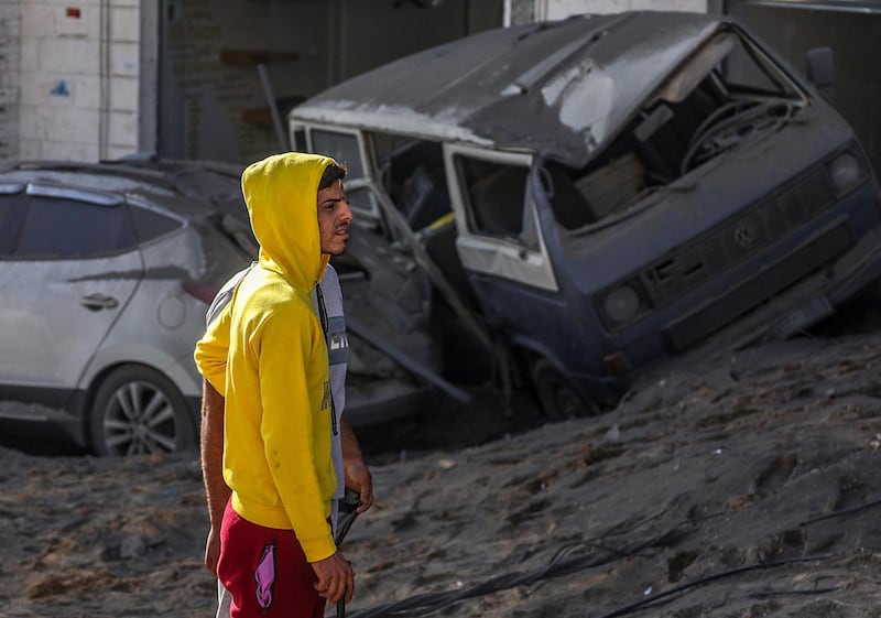 A man looks at the damage in the aftermath of overnight Israeli air strikes on Gaza. EPA