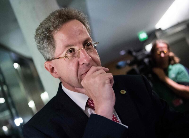 Hans-Georg Maassen, President of the domestic intelligence service of the Federal Republic of Germany (Bundesamt fuer Verfassungsschutz, BfV) leaves after he faced a parliamentary committee of domestic and security affairs after recent far-right demonstrations in the eastern town of Chemnitz on September 12, 2018 in Berlin. - Secret services typically work away from the limelight, but Germany's top domestic spy Hans-Georg Maassen has repeatedly crashed into the public eye, with his latest outing pitting him directly against Chancellor Angela Merkel. (Photo by Bernd von Jutrczenka / dpa / AFP) / Germany OUT