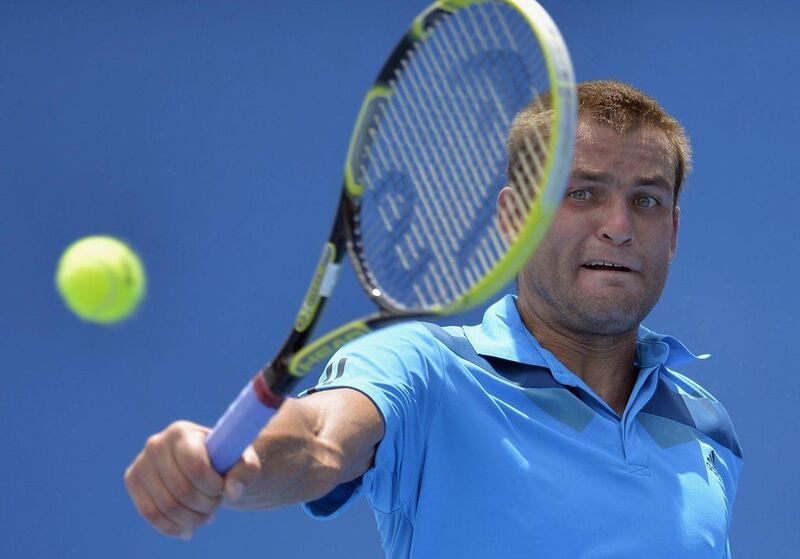 Player: Mikhail Youzhny, Russia. World ranking: No 15. 2013 Dubai Tennis Championship result: second round (def. by Daniel Brands 4-6, 4-6). Franck Robichon / EPA