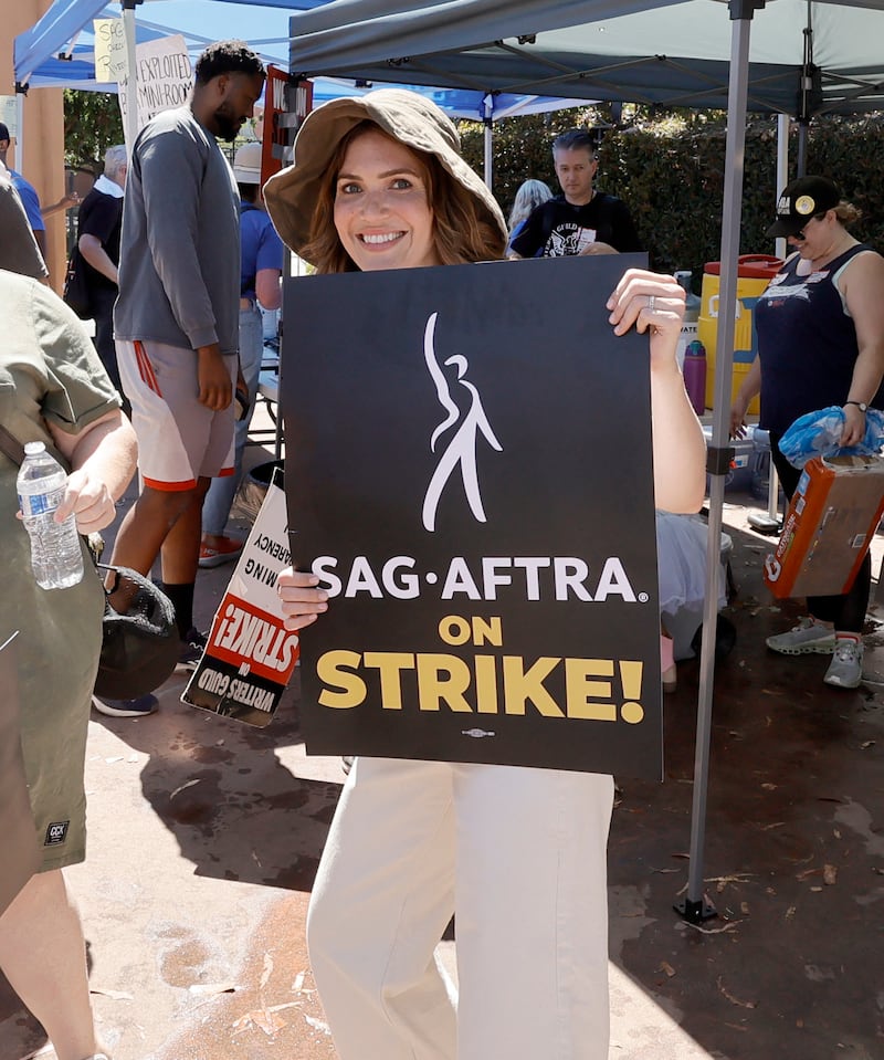 Actress Mandy Moore joins Sag-Aftra and WGA strikers in Los Angeles. AFP