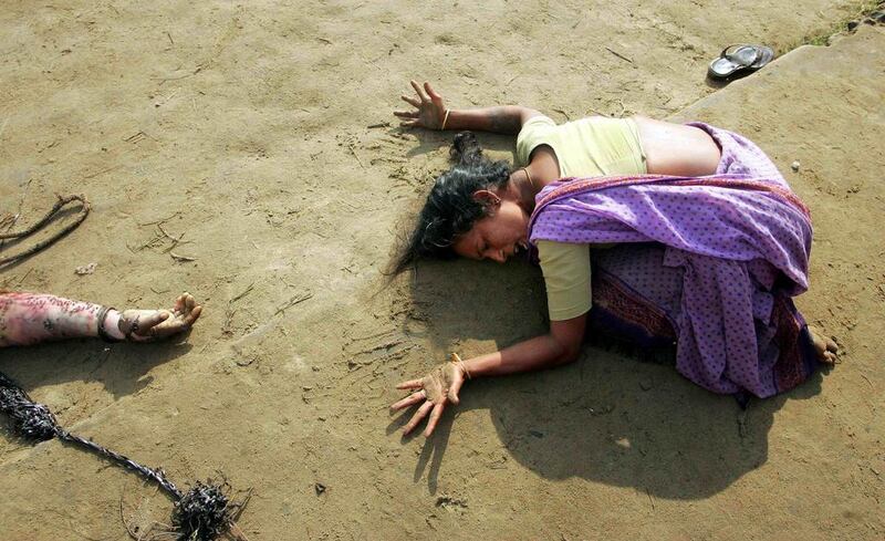 An Indian woman mourns the death of her relative who was killed in the tsunami in Cuddalore, some 180 km (112 miles) south of the southern Indian city of Madras on December 28, 2004. Arko Datta / Reuters