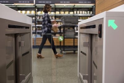 An turnstile entrance to the Amazon Go store is seen in Seattle, Washington, U.S., on Wednesday, Jan. 17, 2018. After more than a year of testing with an employee-only focus group, Amazon Go opens to the public Monday in downtown Seattle, putting to the test the online retailer's technology that lets shoppers grab what they want and leave without paying a cashier. Photographer: Mike Kane/Bloomberg