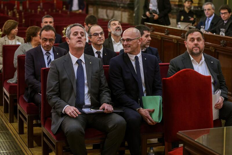 epa07363843 Former regional Vice President Oriol Junqueras (R), former regional Foreign Minister Raul Romeva (C), regional Minister of Interior Joaquim Forn (L) and other nine other accused are seen at the start of the so-called  'process' trial against 12 Catalan pro-independence politicians involved in the illegal referendum held back in 2017 at the Supreme Court in Madrid, Spain, 12 February 2019. The trial against the Catalan politicians involved in the illegal pro-independence referendum kicks off in the Spanish capital with nine of the pro-independence leaders being accused of rebellion and embezzlement for their role in the Catalan illegal independence referendum back in 2017, while the other three face disobedience charges. More than 500 people have been called to testify, some of them former members of the Spanish Government such as former Prime Minister Mariano Rajoy.  EPA/EMILIO NARANJO / POOL