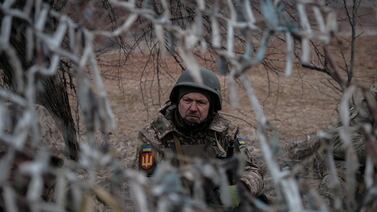 A Ukrainian soldier on duty in the Donetsk region. Kyiv has lowered the draft age, launched a recruitment campaign and passed a mobilisation law. EPA