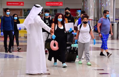 Tourists arrive at Dubai International Airport. Photo: AFP