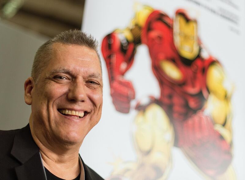 epa05345441 US comic book writer Bob Layton poses in front of an image of Marvel comic character Iron Man, which he has worked on, at the MCM Comic Con in Hanover, Germany, 04 June 2016. Exhibitors, stars and fans will gather for the event to be held from 04 to 05 June.  EPA/SEBASTIAN GOLLNOW *** Local Caption *** 52803051