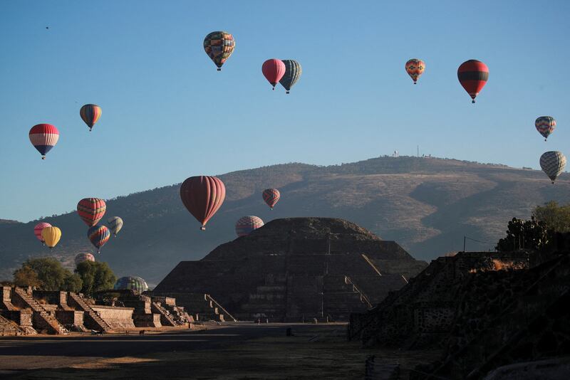 Balloons float above the Teotihuacan, on the outskirts of Mexico City, on the day of the spring equinox. Reuters