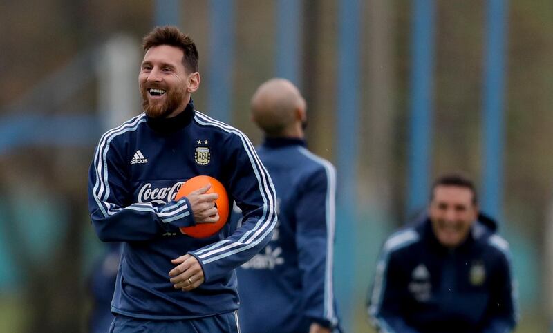 Argentina's Lionel Messi smiles during a training session in preparation for a 2018 Russia World Cup qualifying soccer match against Venezuela, in Buenos Aires, Argentina, Sunday, Sept. 3, 2017. (AP Photo/Natacha Pisarenko)