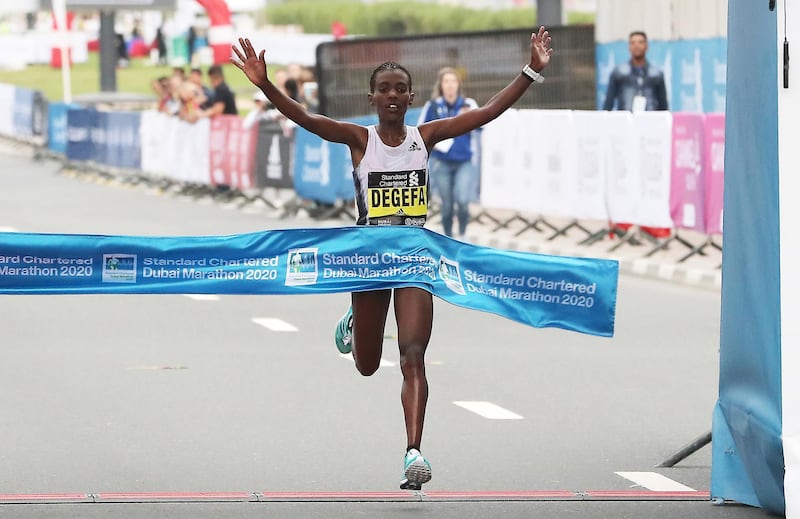 DUBAI, UNITED ARAB EMIRATES , Jan 24  – 2020 :-  Worknesh Degefa Debele from Ethiopia after winning the women Standard Chartered Dubai Marathon 2020 held on the Umm Suqeim Road in Dubai. ( Pawan  Singh / The National ) For News/Online/Instagram.