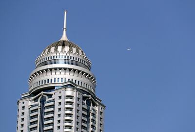 Dubai, United Arab Emirates - Reporter: N/A. News. Standalone. A plane flies passed the Princess Tower in the Dubai marina. Monday, June 22nd, 2020. Dubai. Chris Whiteoak / The National