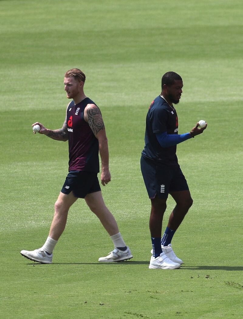 England's Ben Stokes, left, and Chris Jordan prepare to bowl during their training session. AP