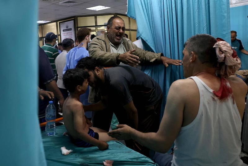 Palestinians inside a hospital in the northern Gaza Strip. Nine people were killed amid air raids in the Gaza Strip, local authorities said. It was unclear whether the deaths were caused by the air strikes. Israel said it bombed Hamas targets in Gaza in response to rocket fire directed towards Israel. AFP