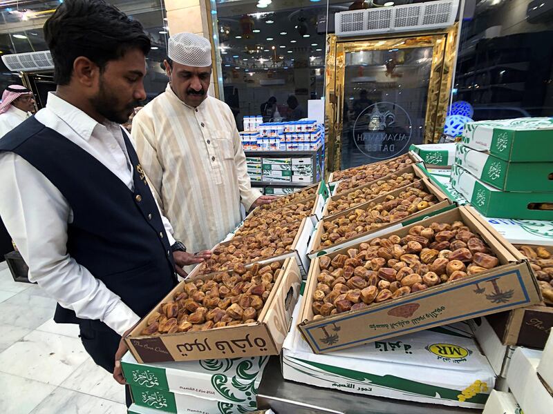 A man shops for dates in Dammam, Saudi Arabia. Reuters