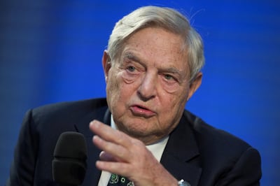 FILE PHOTO: Soros Fund Management Chairman George Soros speaks during a panel discussion at the Nicolas Berggruen Conference in Berlin, October 30, 2012. REUTERS/Thomas Peter/File Photo