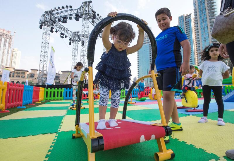 DUBAI, UNITED ARAB EMIRATES - Kids starting young to be fit at the closing weekend carnival of the second year of the Dubai Fitness Challenge at Burj Park, Dubai.  Leslie Pableo for The National