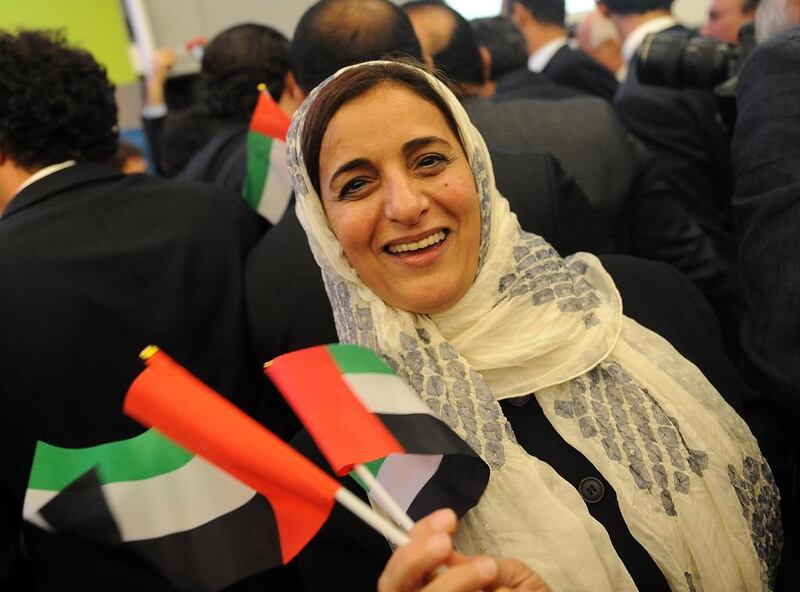 Sheikha Lubna smiles as she celebrates Dubai's Expo victory in Paris. Antoine Antoniol / Getty Images