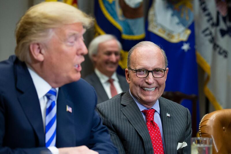 epa06728365 Director of National Economic Council Larry Kudlow smiles as United States President Donald J. Trump speaks with reporters during a meeting with automotive industries executives in the Roosevelt Room of the White House in Washington, DC, USA, on 11 May 2018.  EPA/Alex Edelman / POOL
