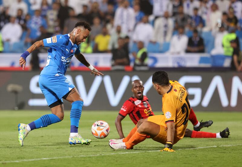 Al Hilal's Neymar is denied a goal by Al Riyadh goalkeeper Martin Campana. Reuters