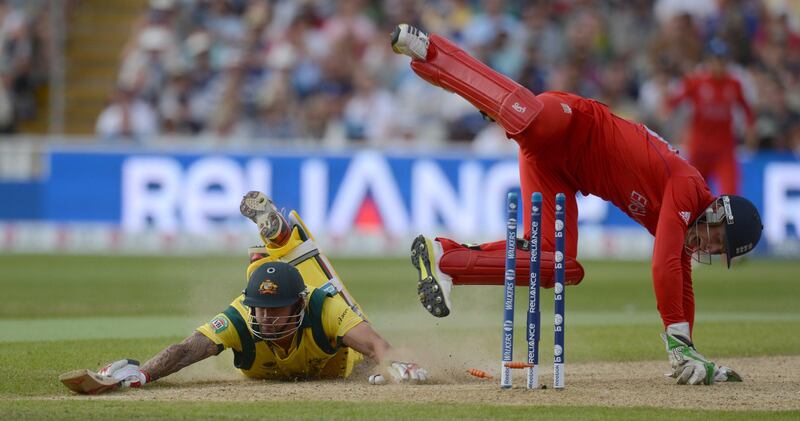Australia's Mitchell Johnson just survives a run out attempt by England's Jos Buttler (R) during the ICC Champions Trophy group A match at Edgbaston cricket ground in Birmingham June 8, 2013. REUTERS/Philip Brown (BRITAIN - Tags: SPORT CRICKET) *** Local Caption ***  PB27_CRICKET-CHAMPI_0608_11.JPG