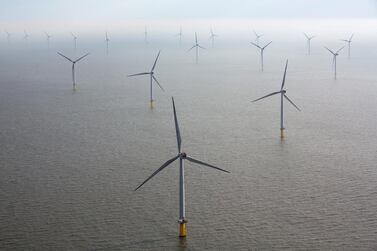 Wind turbines sit in the North Sea at the London Array offshore wind farm, a partnership between Dong Energy and Abu Dhabi-based Masdar. Masdar has just taken a stake in India's wind and solar developer Hero Future Energies. Bloomberg.