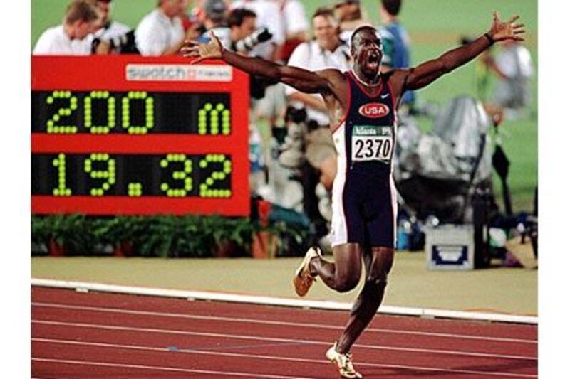 Michael Johnson screams in triumph at the end of the 200m final at the Atlanta Olympics.