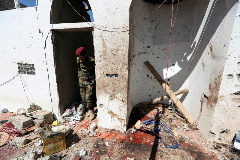 A soldier stands at the site of a Houthi missile attack on a military camp’s mosque in Marib, Yemen January 20, 2020. REUTERS/Ali Owidha