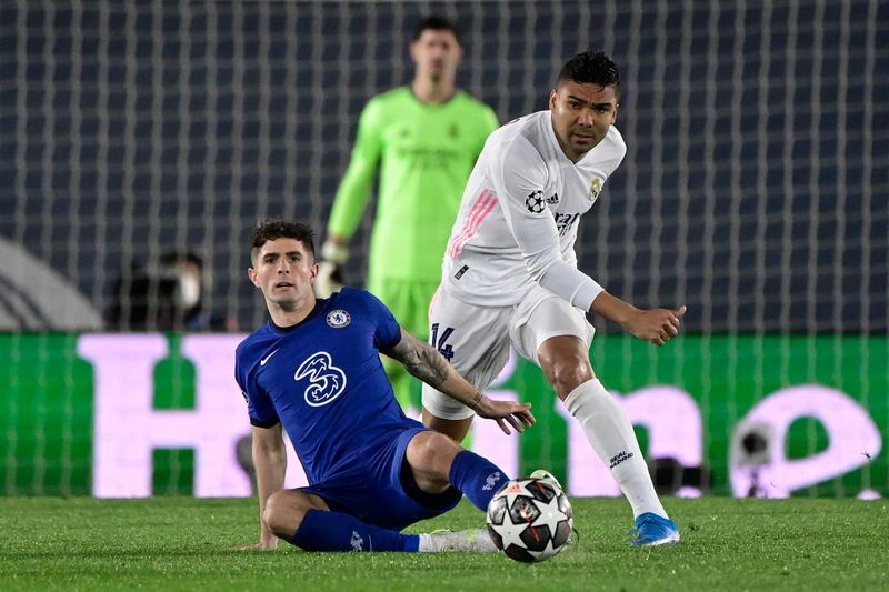 Real Madrid's Casemiro challenges Chelsea's Christian Pulisic. AFP