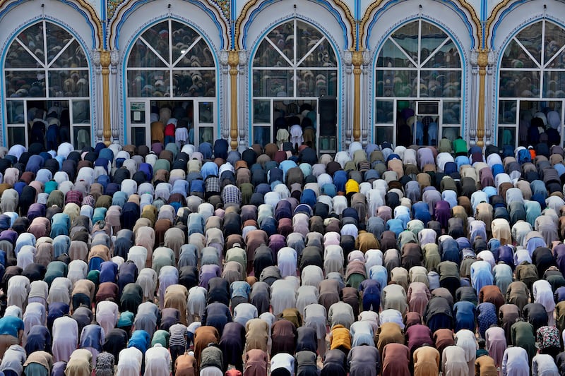 Worshippers offer Friday prayers at Jaamia Masjid in Rawalpindi, Pakistan. AP